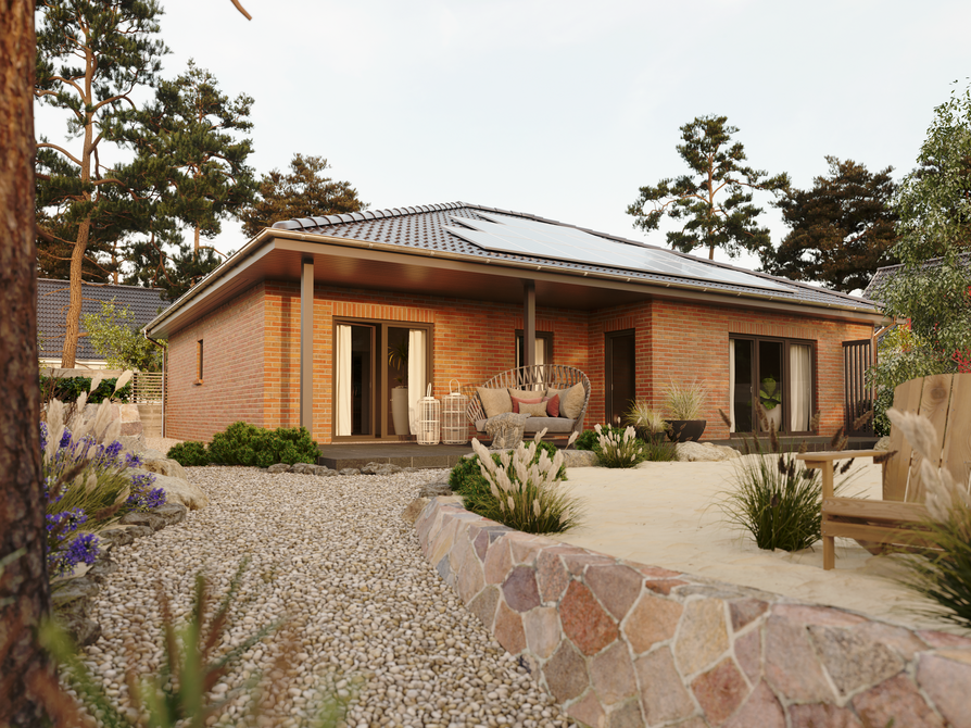 Bungalow 128 mit heller Spreeland-Klinkerfassade, großzügiger Terrassenbereich und geschwungener Kiesweg